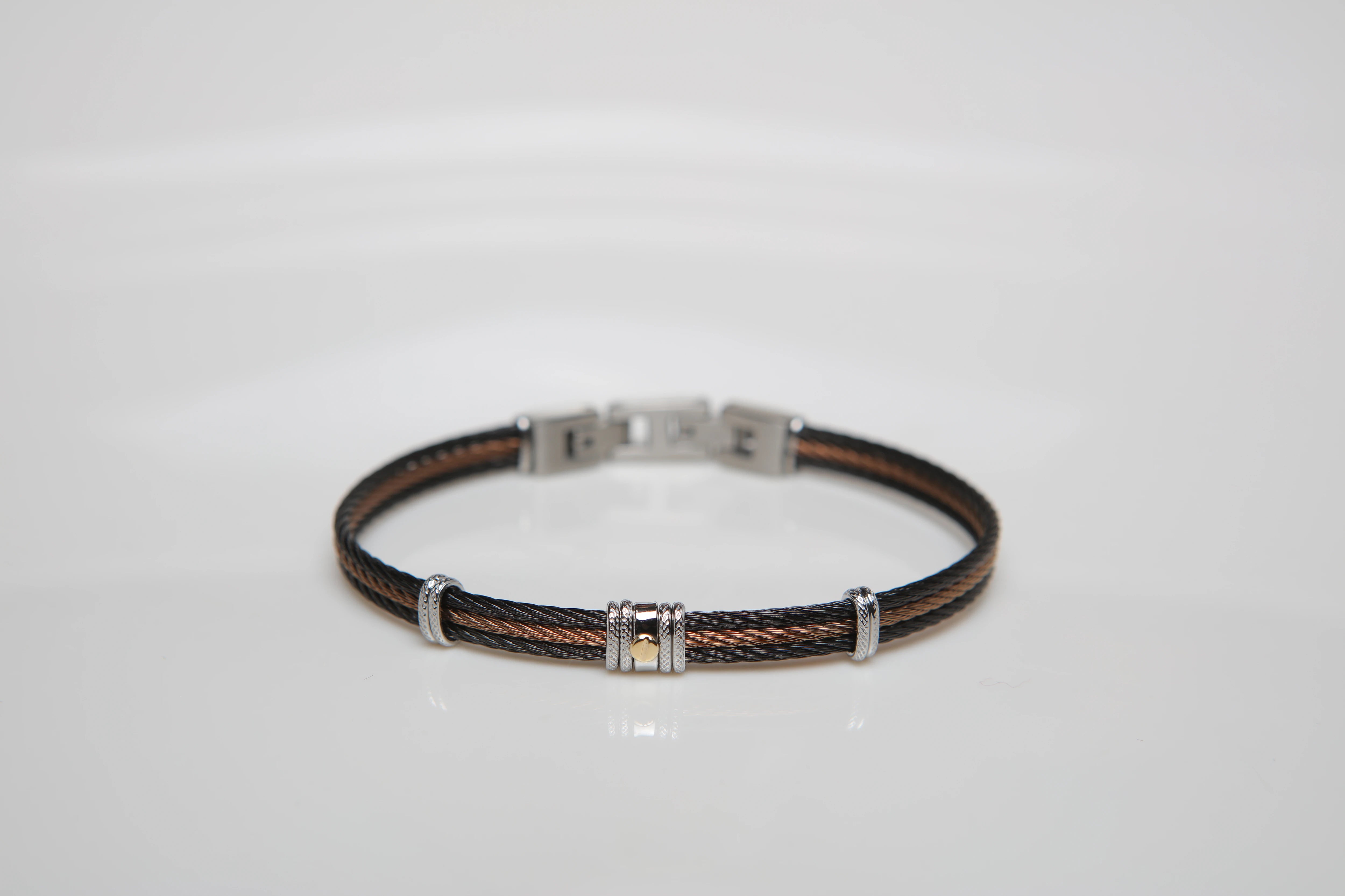 Bracelet with black and brown PVD steel cable with central gold screw in 18Kt