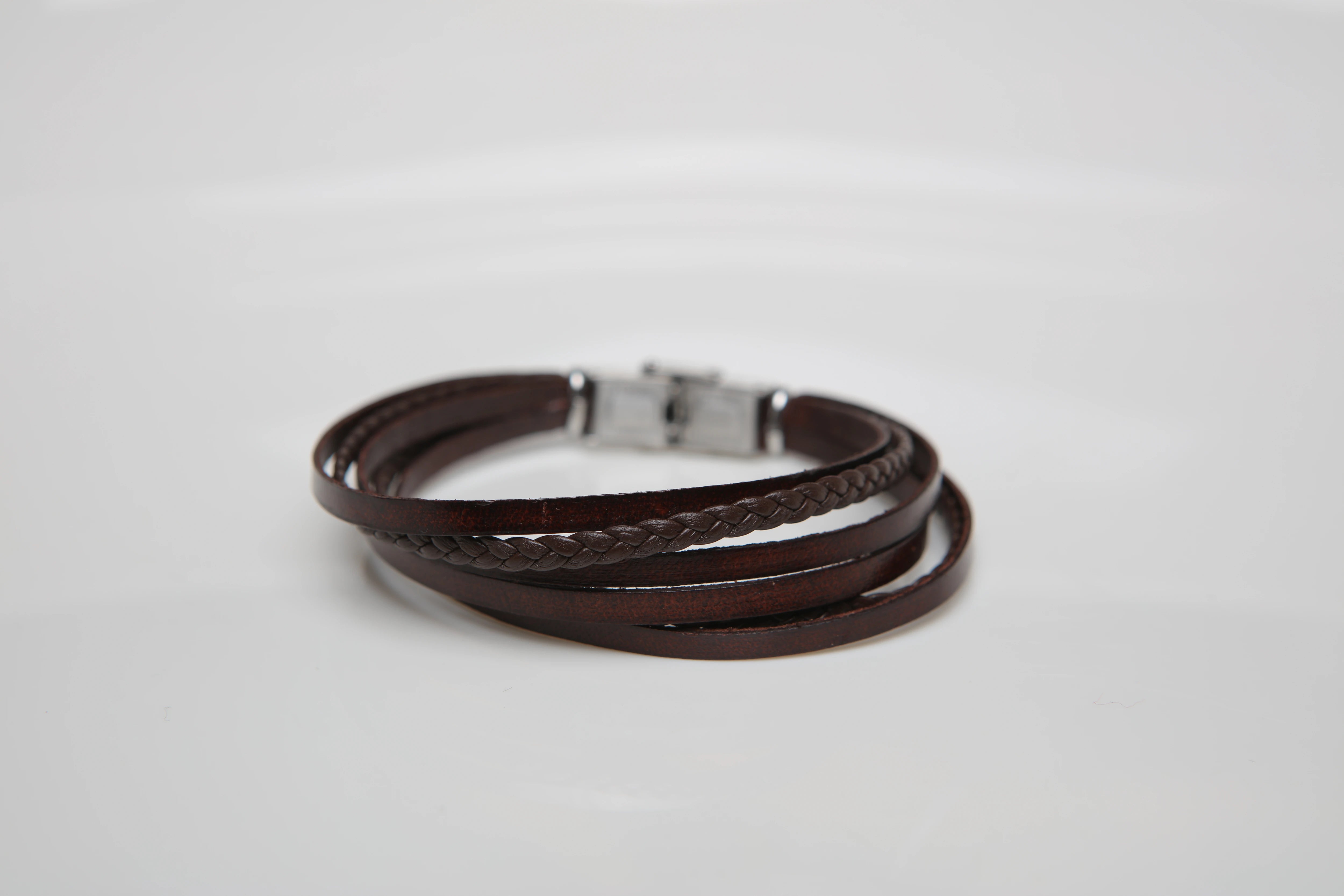 Stainless steel and leather bracelet with multi-strand brown braid