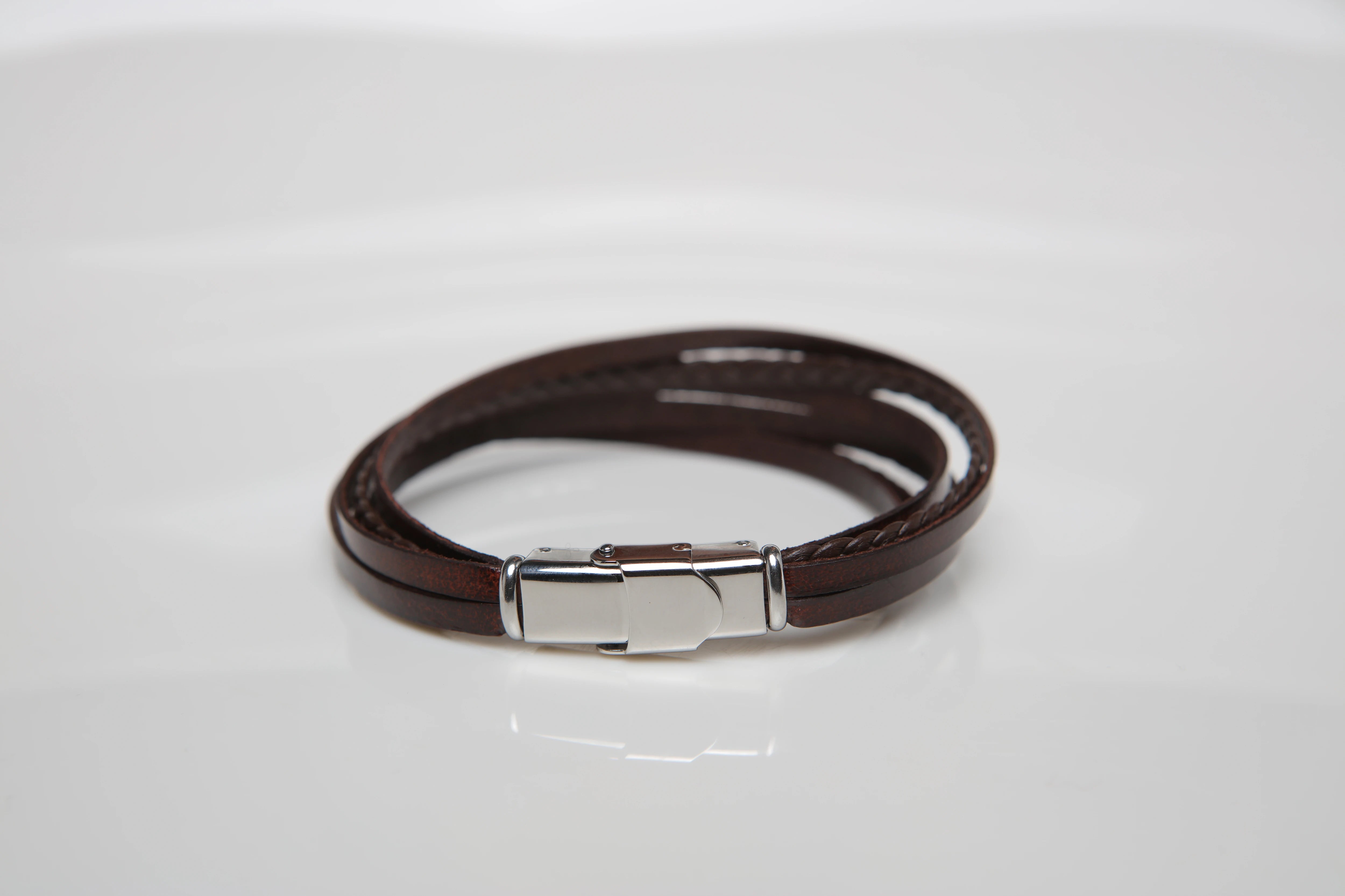 Stainless steel and leather bracelet with multi-strand brown braid