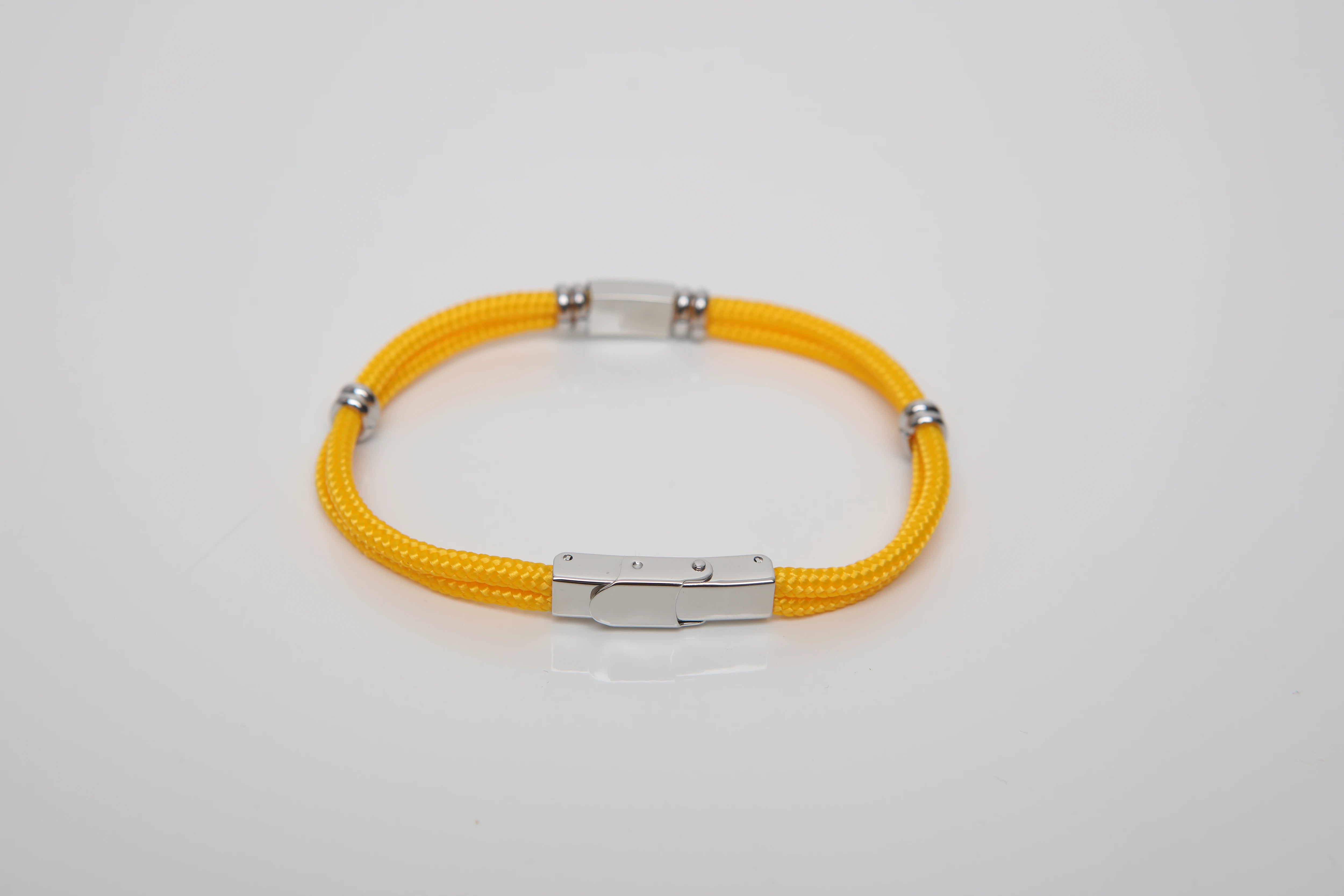 Stainless steel bracelet and yellow nautical rope with central enameled flag