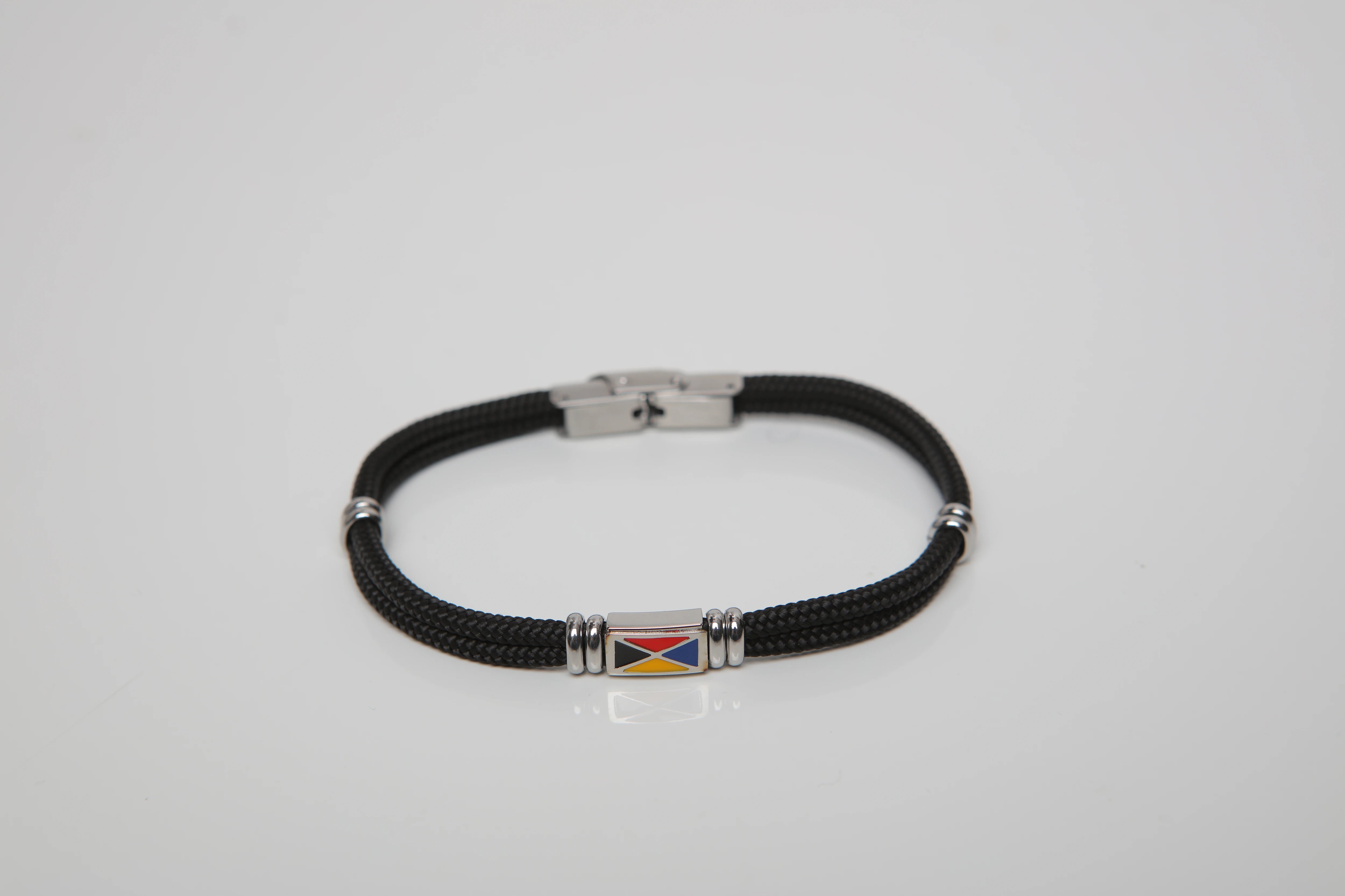 Stainless steel bracelet and black nautical rope with central enameled flag