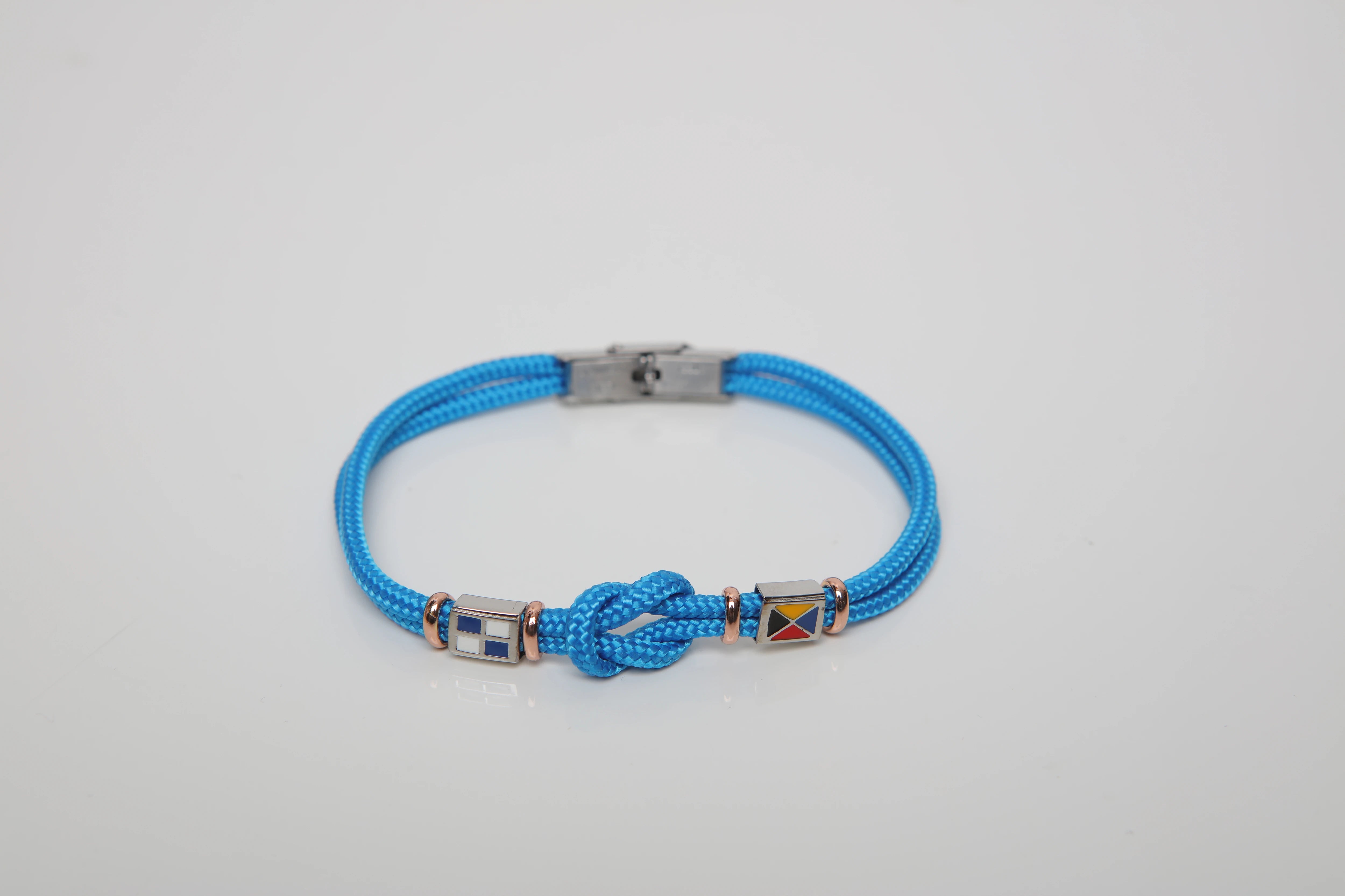 Stainless steel bracelet and light blue nautical rope and flags