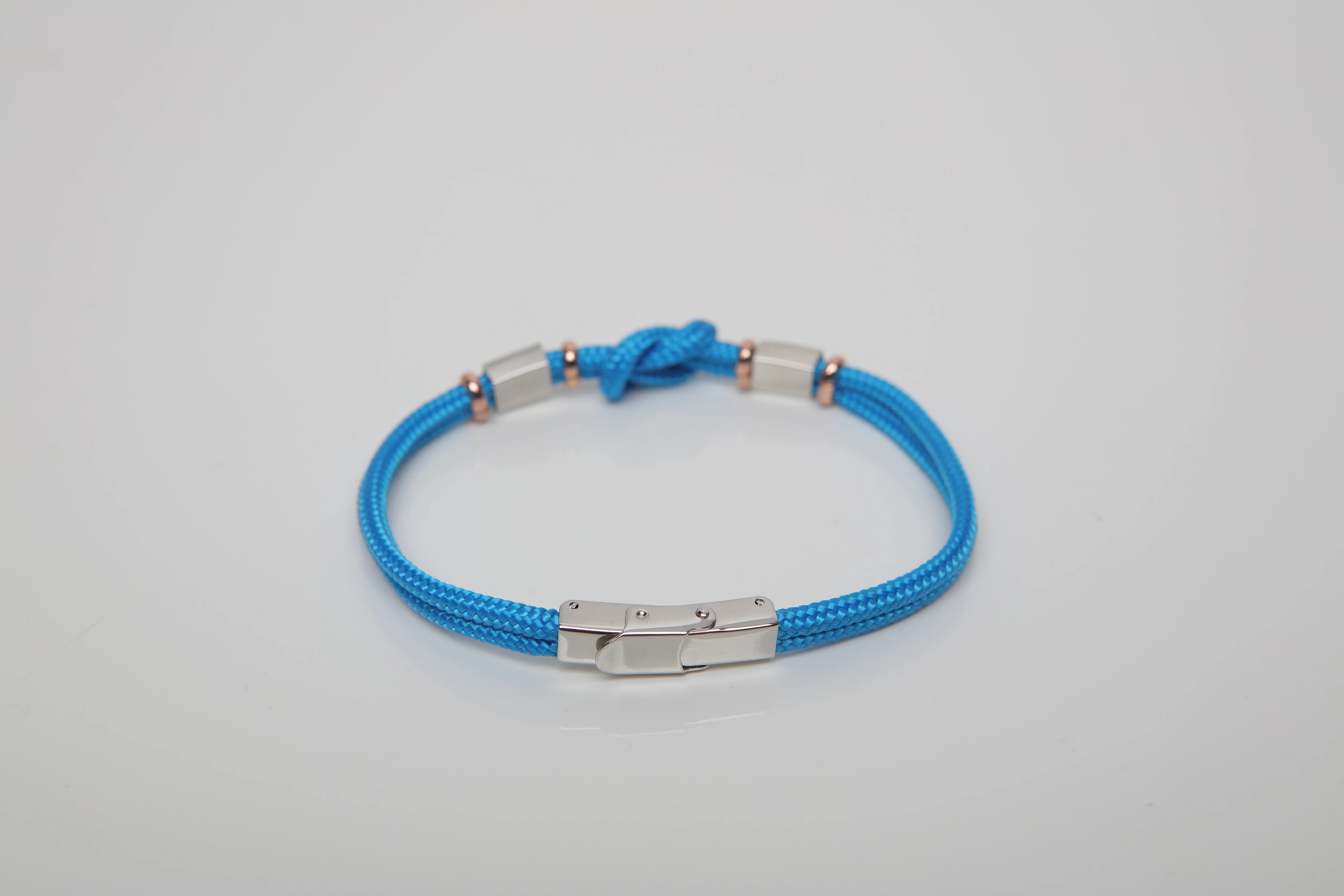 Stainless steel bracelet and light blue nautical rope and flags