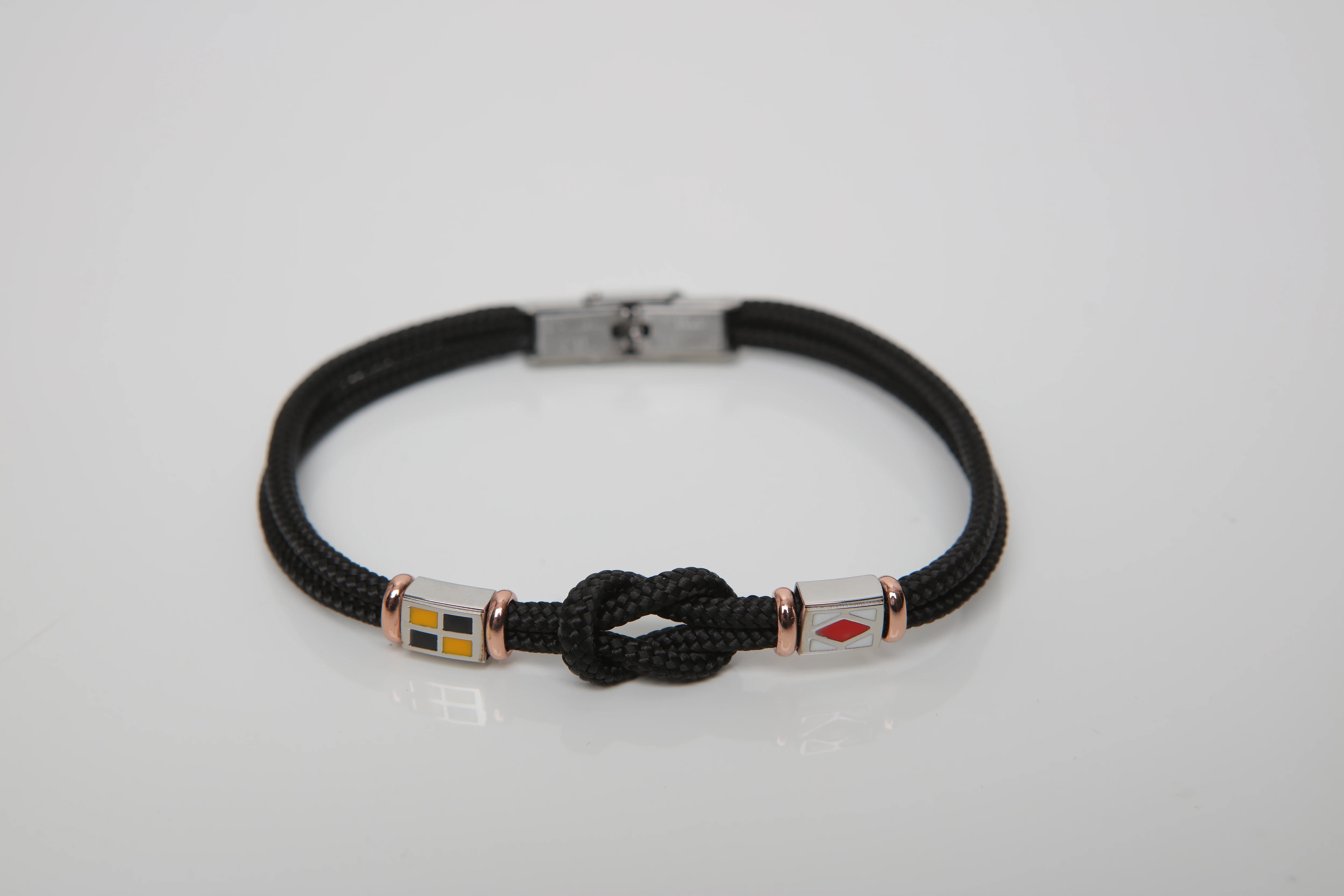 Stainless steel bracelet and black nautical rope and flags