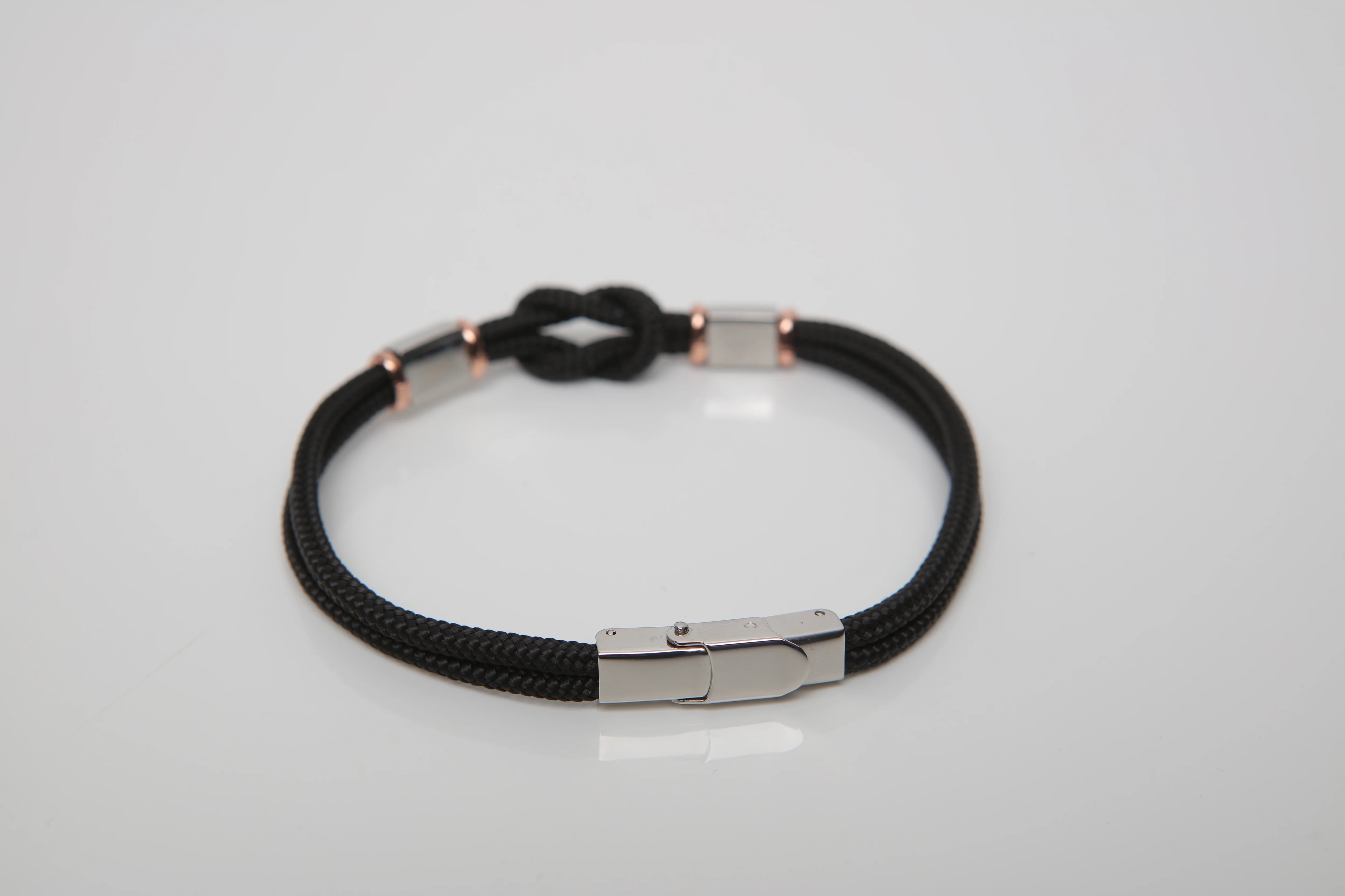 Stainless steel bracelet and black nautical rope and flags