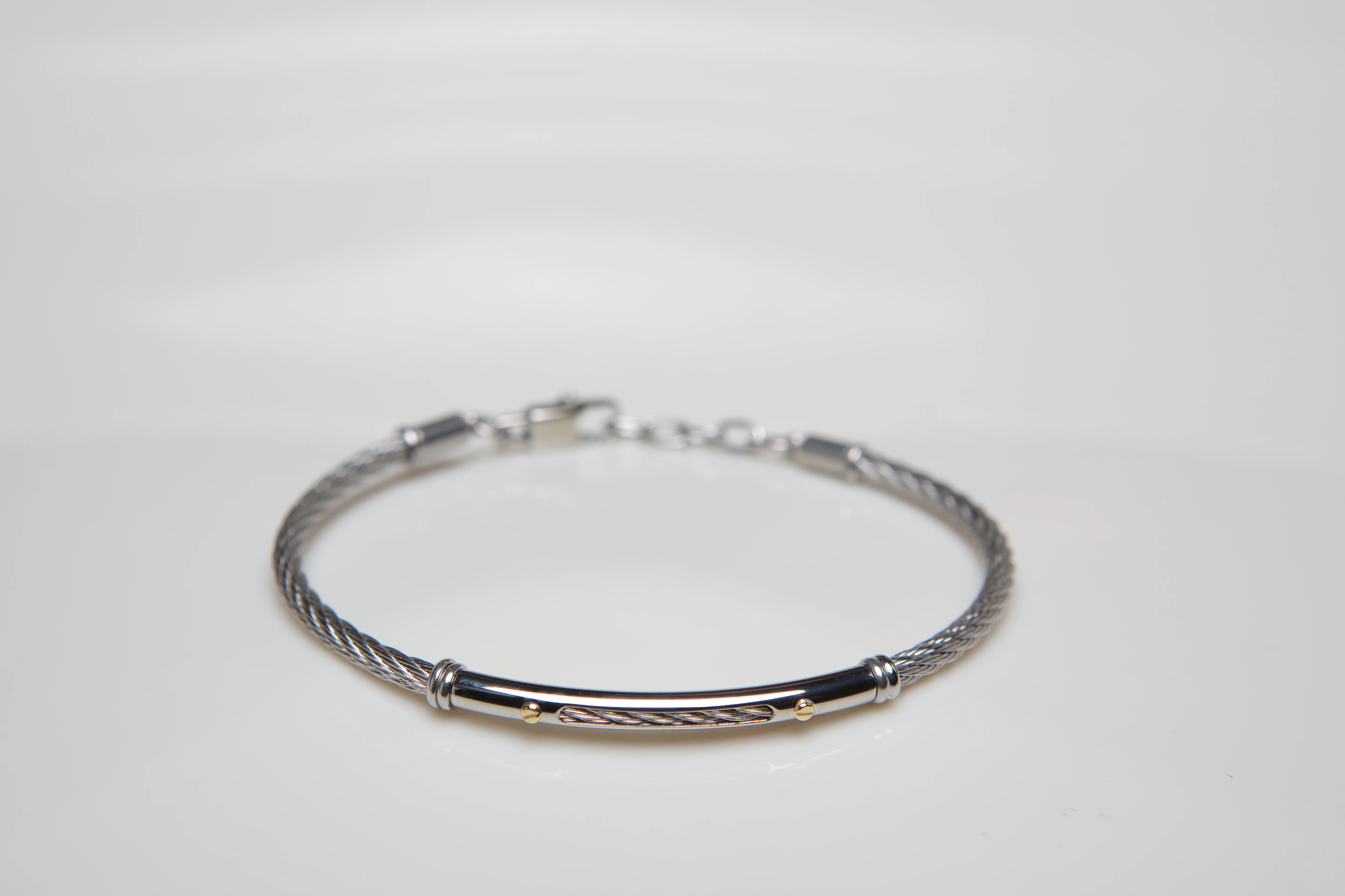 Cable bracelet in stainless steel and 18kt gold