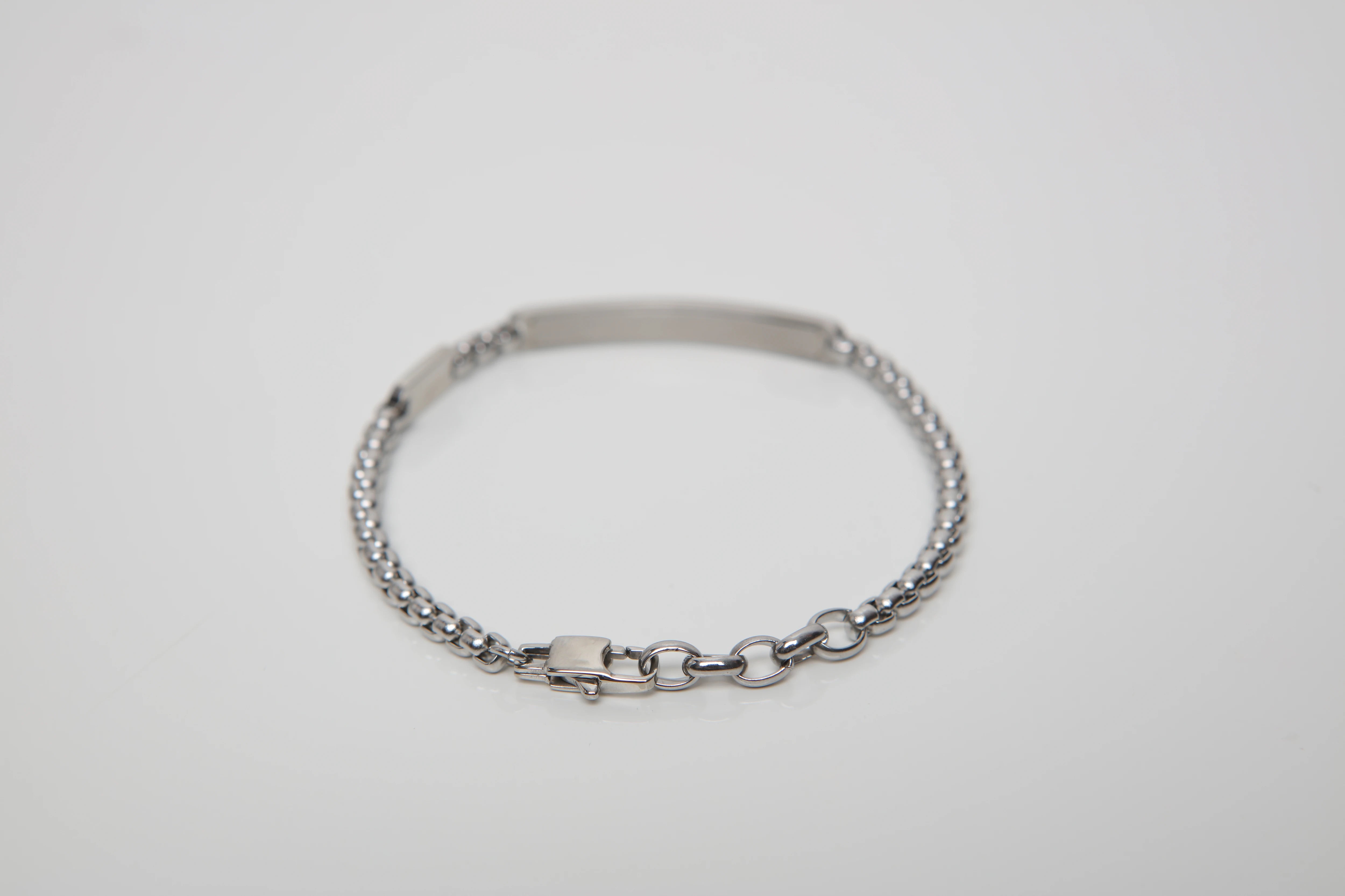 Bracelet with chain in stainless steel and 18Kt gold