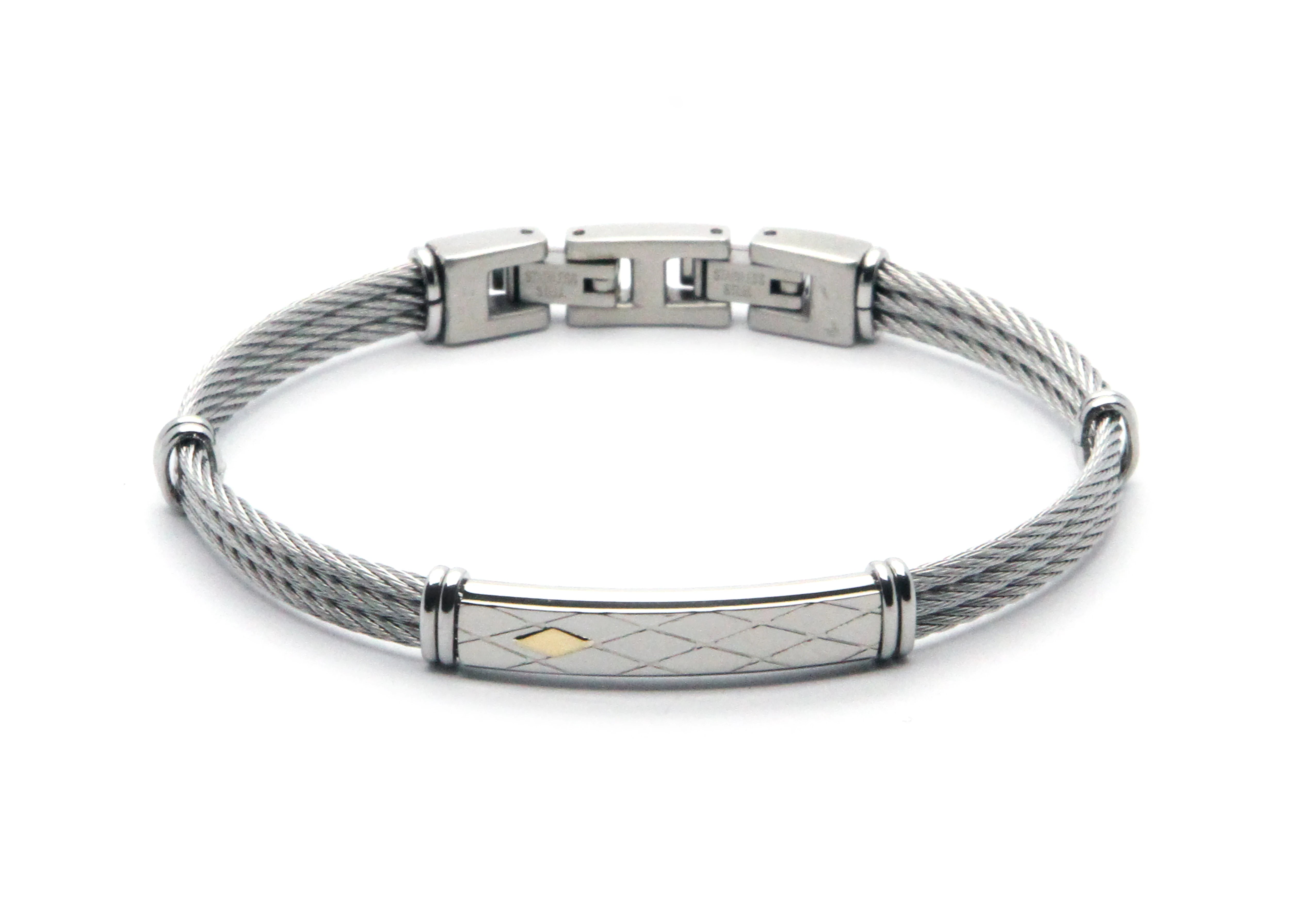 Stainless steel cable bracelet with plate and 18kt gold