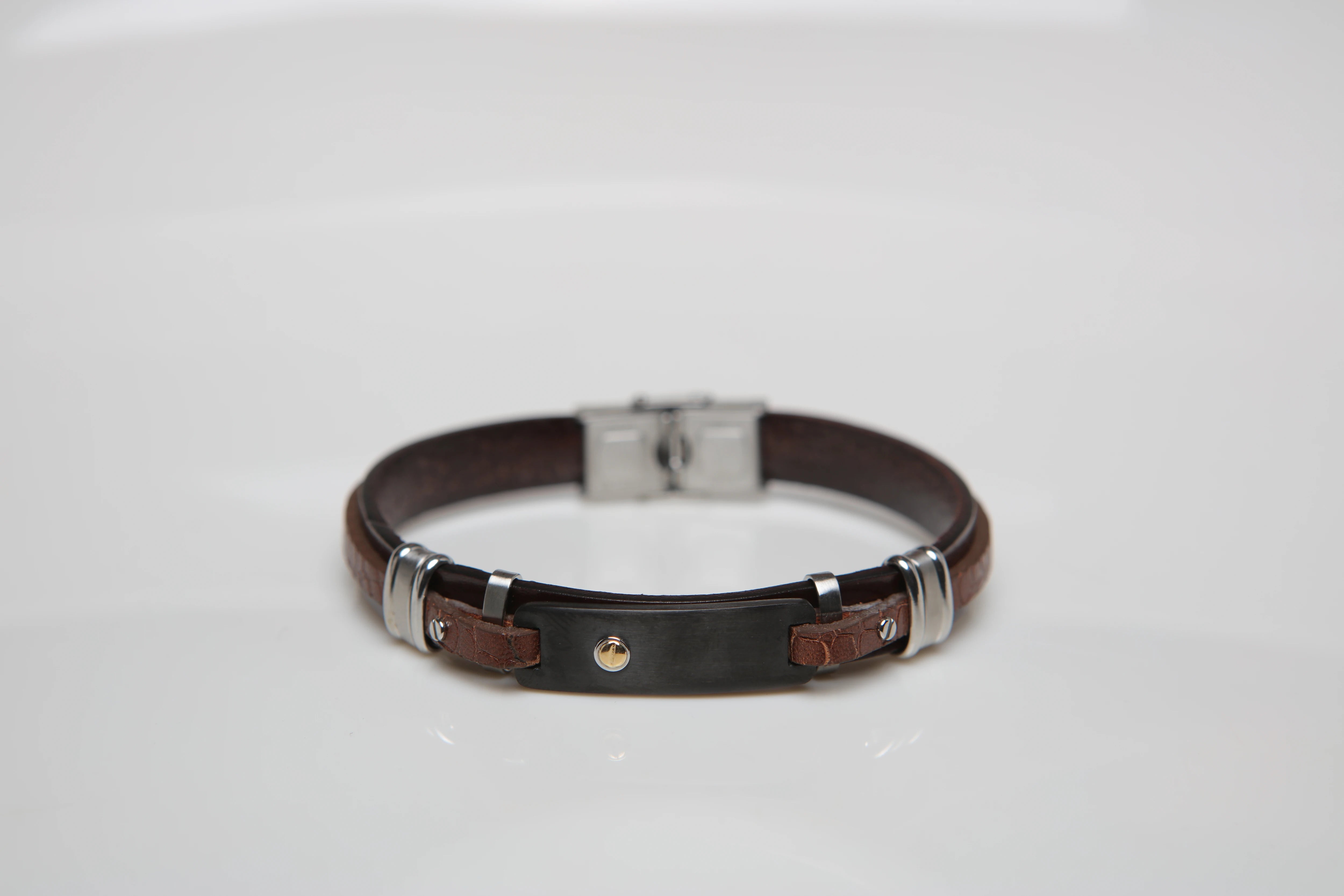 Stainless steel and leather bracelet with brown Texture and gold screw