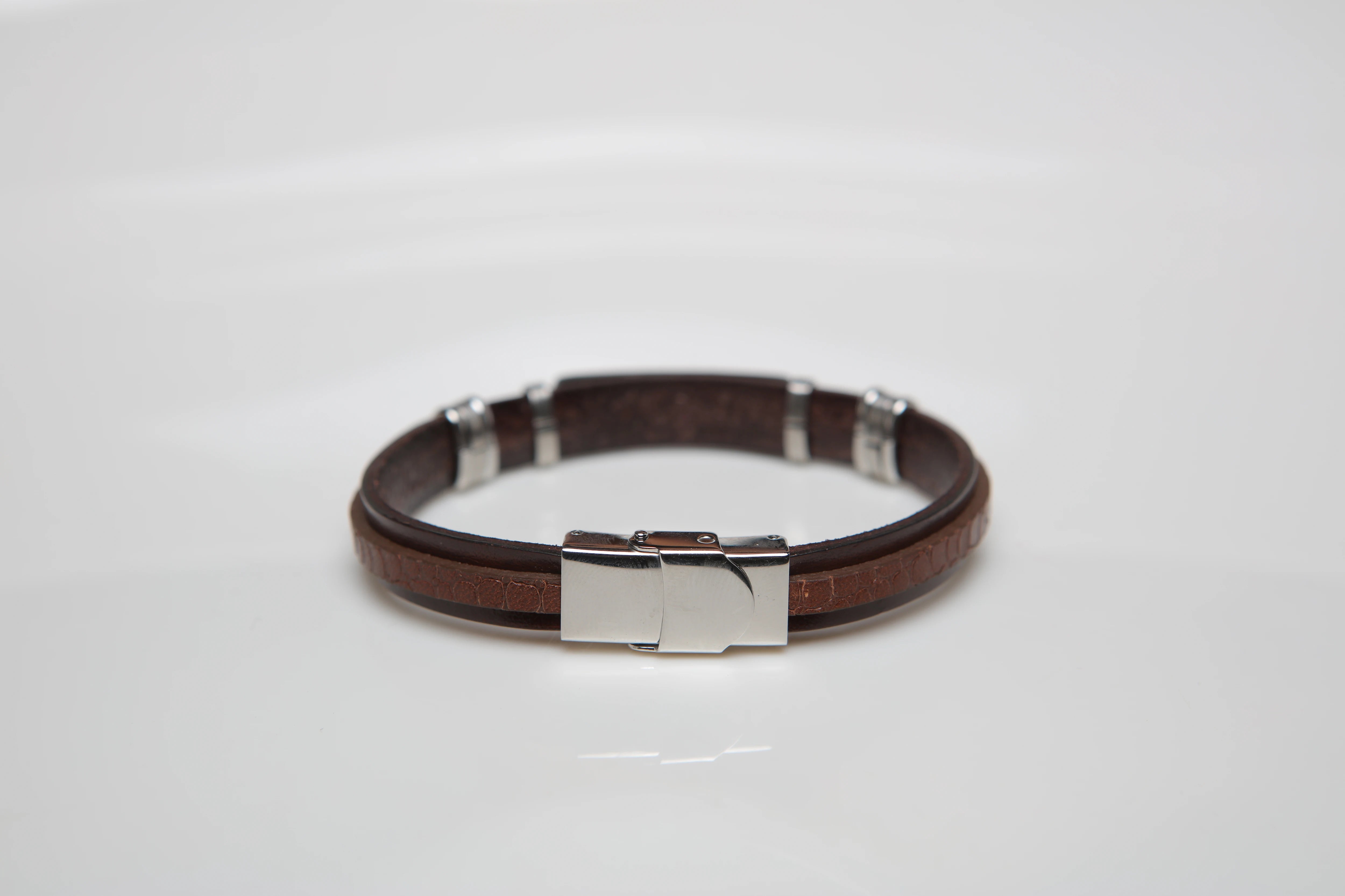 Stainless steel and leather bracelet with brown Texture and gold screw