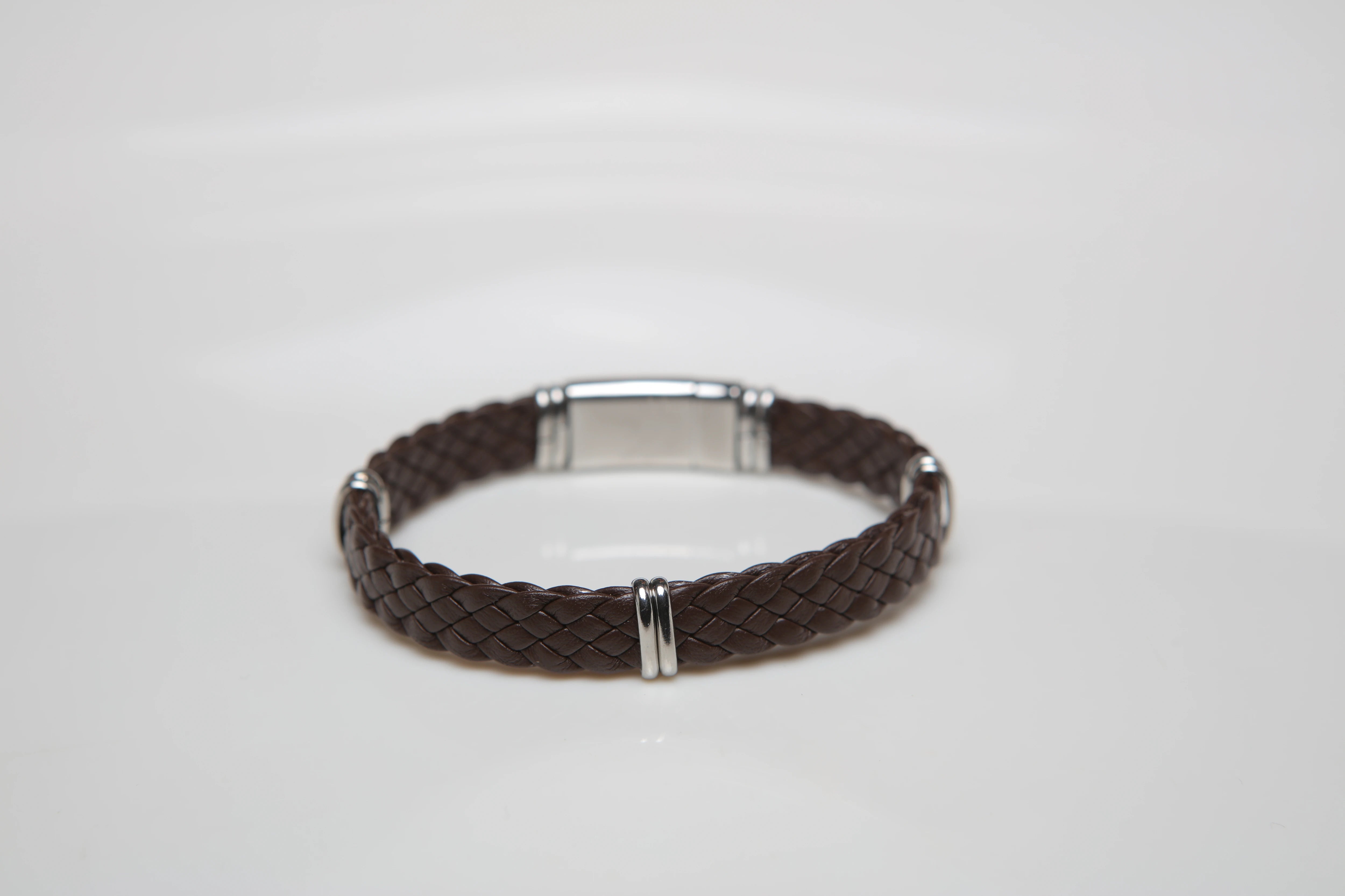 Brown braided leather bracelet with semi-finished products and stainless steel clasps