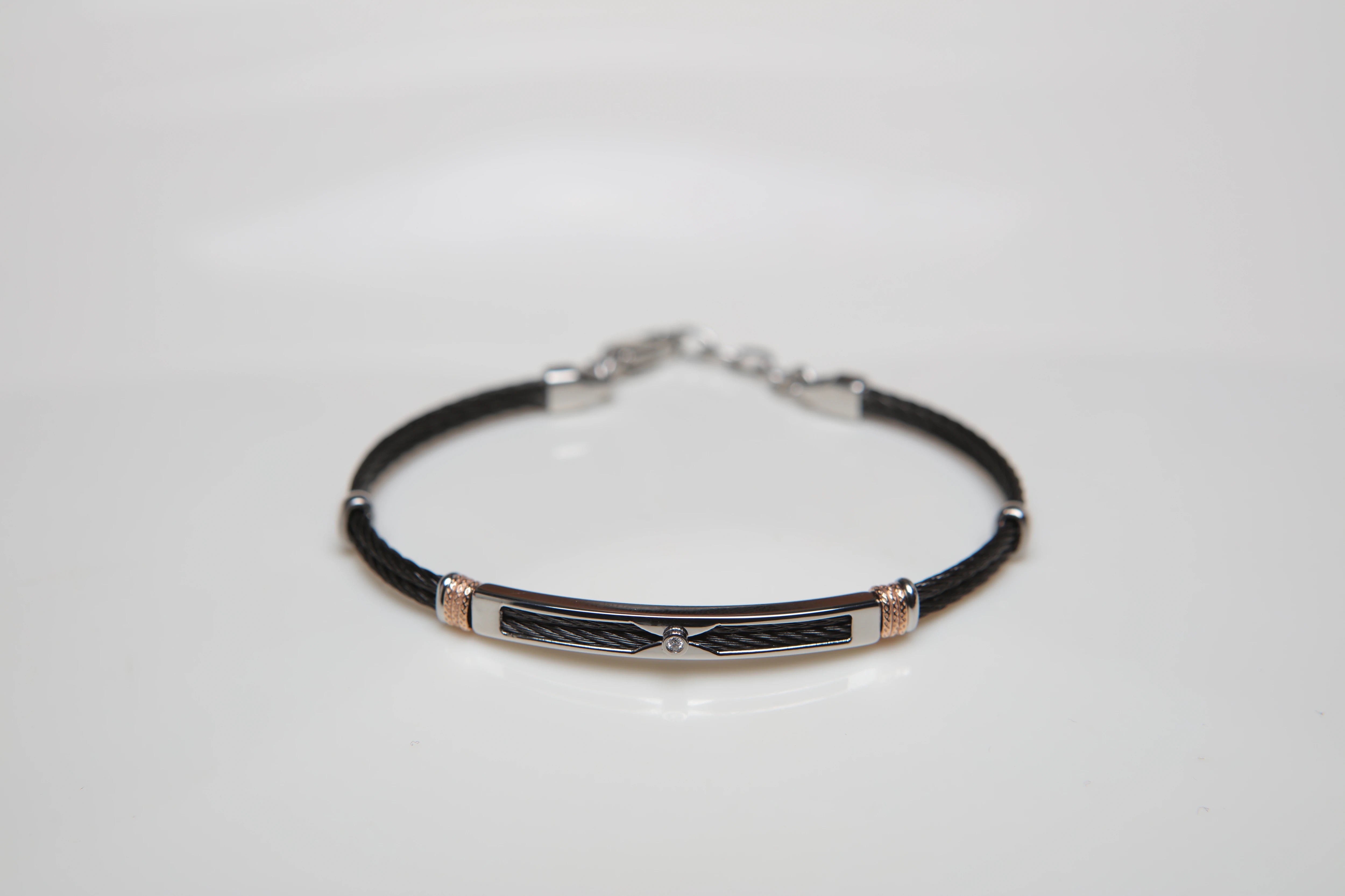 Black PVD steel cable bracelet with knurled rosé links and Natural Diamond