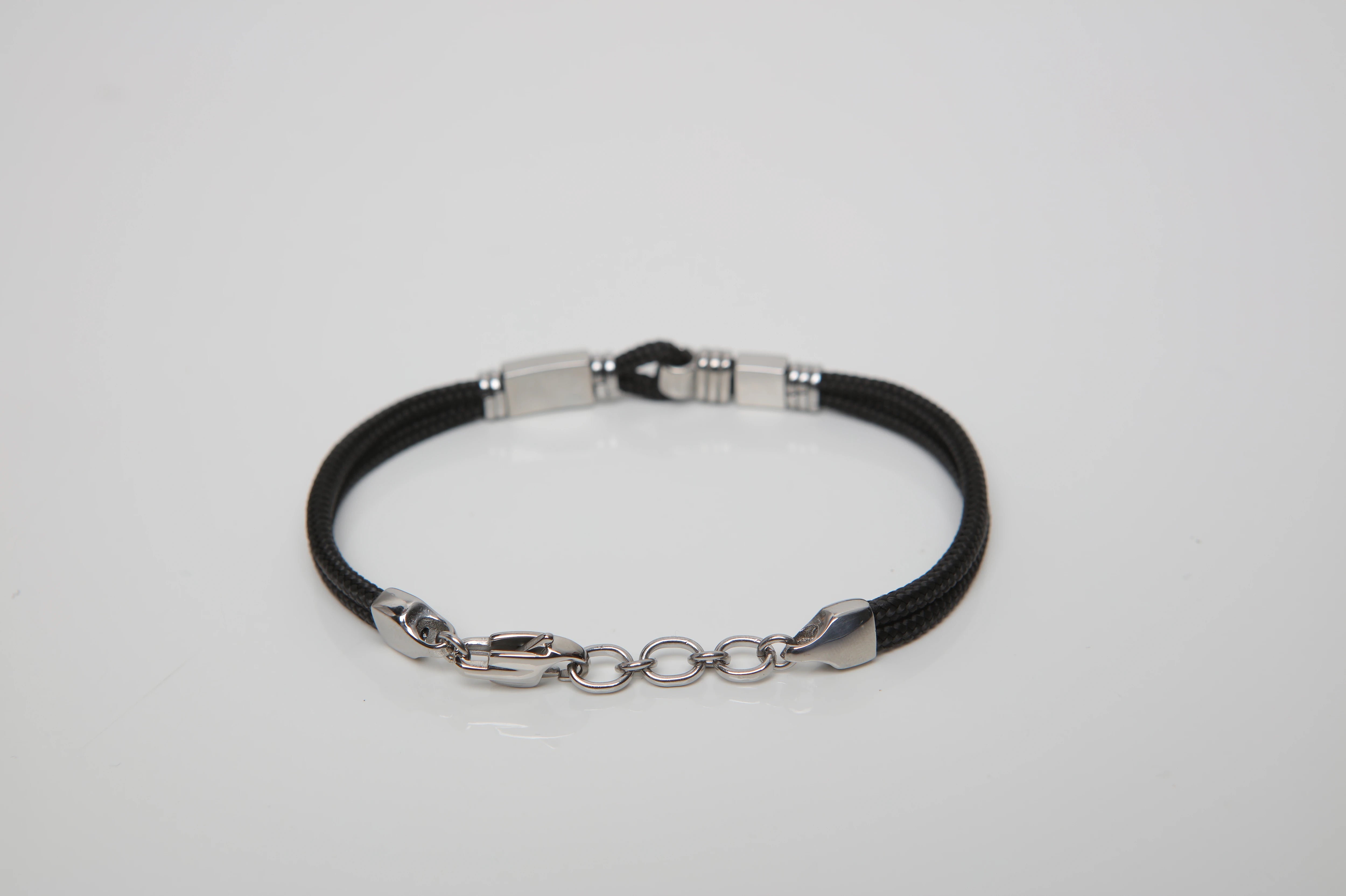 Stainless steel bracelet with micro-cast blank and black nautical rope