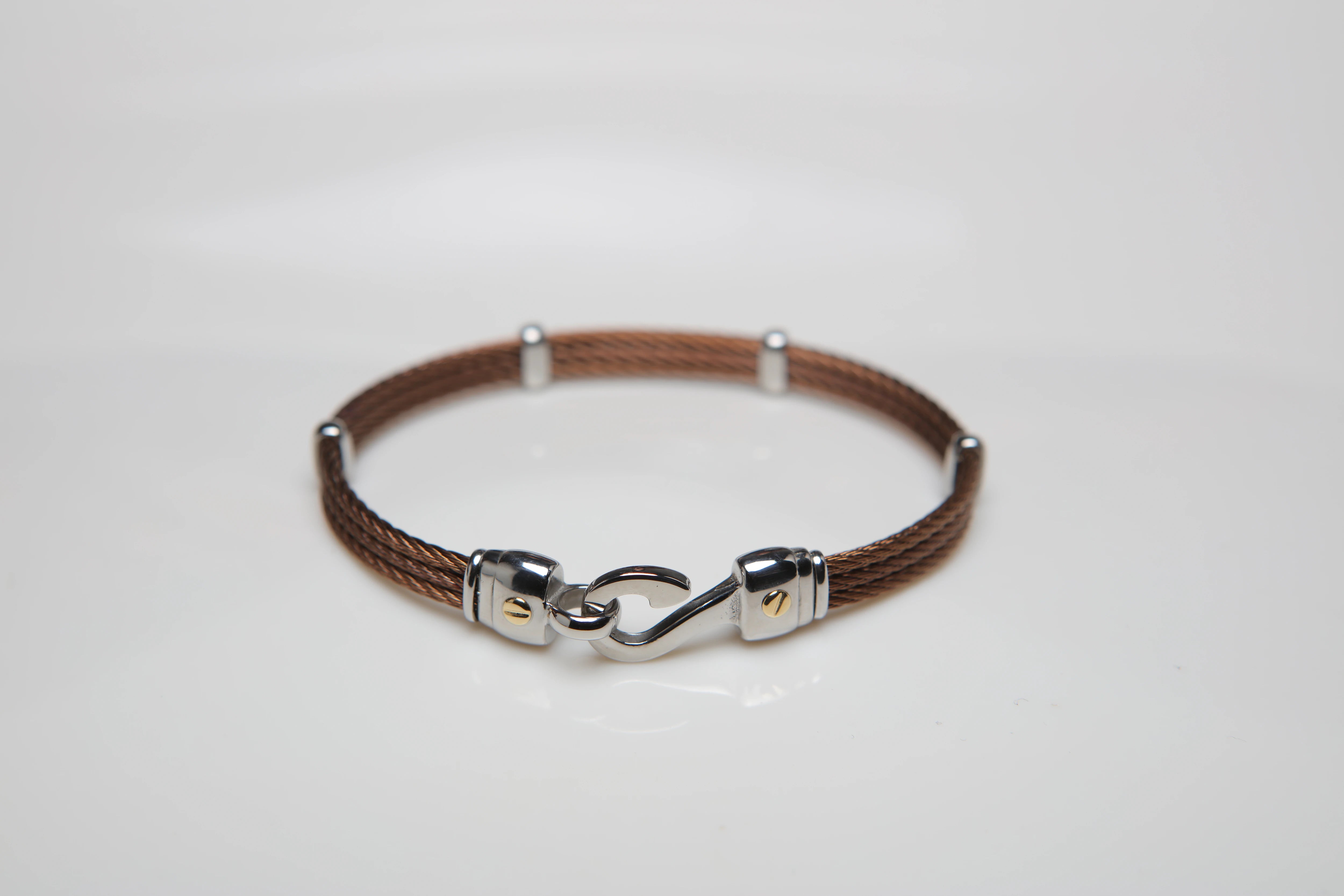 Bracelet and hook in stainless steel in brown PVD and 18Kt gold screws