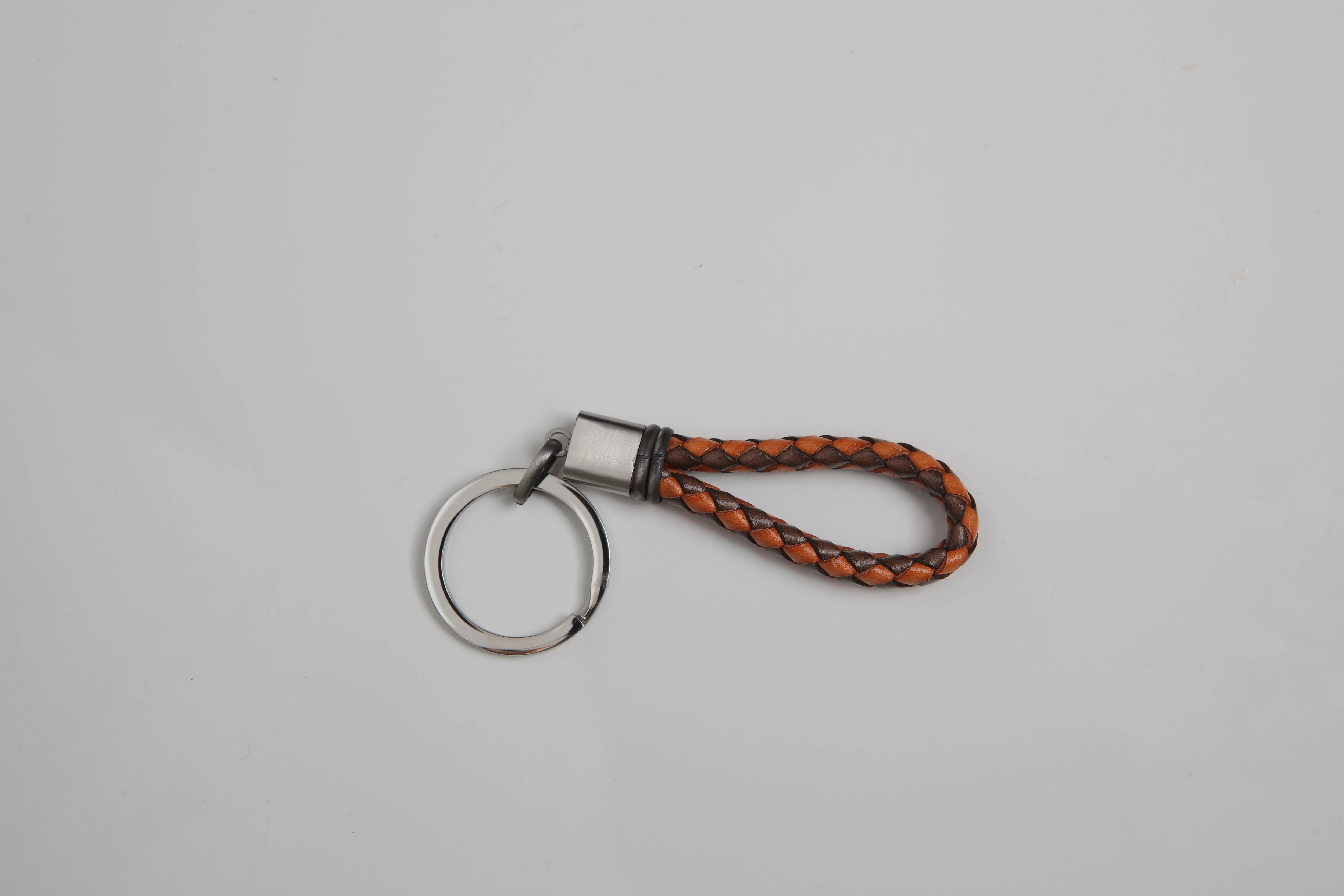 Stainless steel keyring with brown/orange braided leather and vintage steel