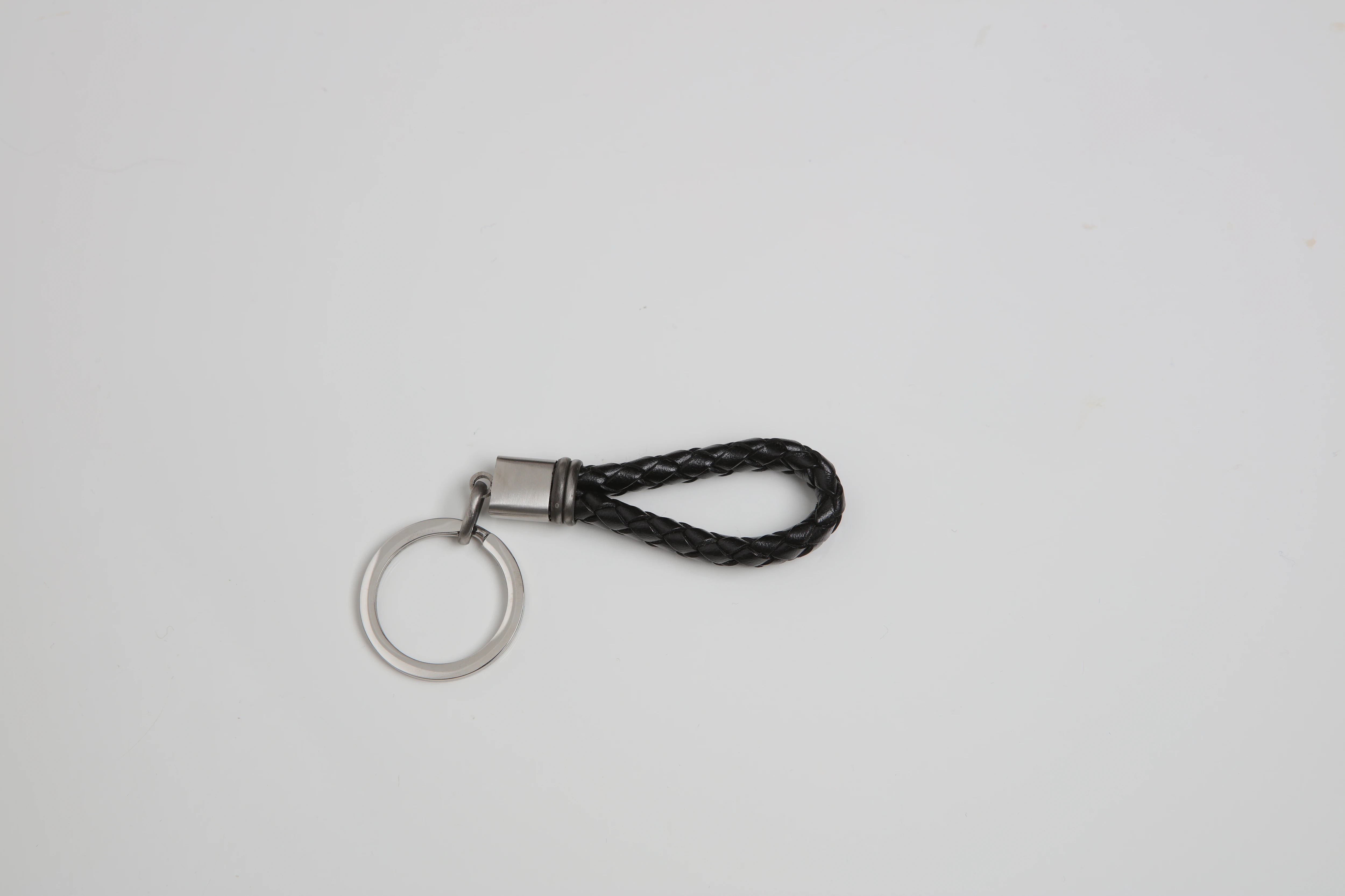 Stainless steel keyring with black braided leather and vintage steel