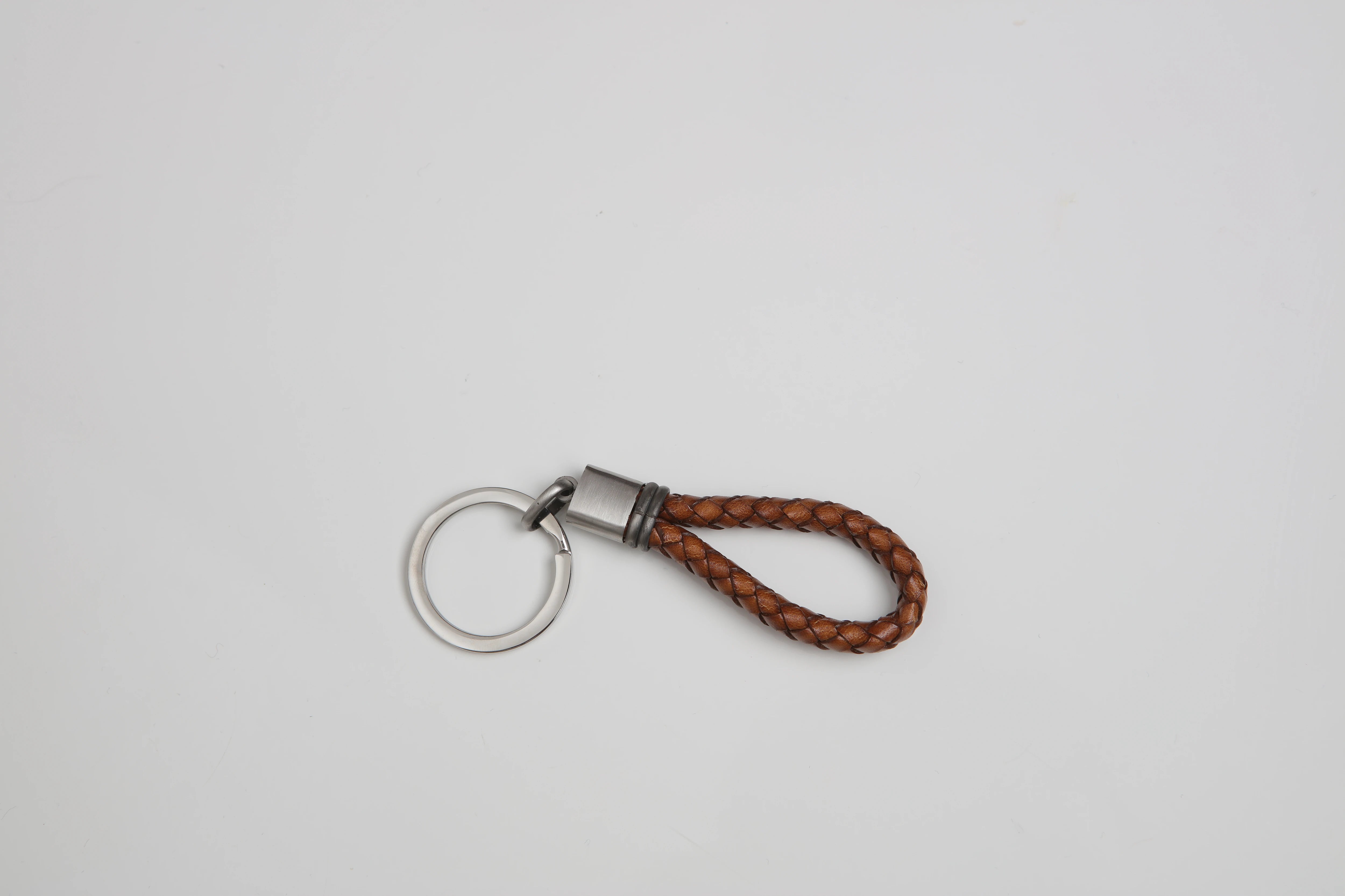 Stainless steel keyring with brown braided leather and vintage steel